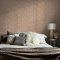 Room styled with Abigail Ahern Heirloom Knit Baked Beige wallpaper in a cosy, neutral setting
