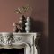 Fireplace wall painted in Abigail Ahern Java with earthy, layered textures