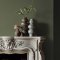 Fireplace wall painted in Abigail Ahern Kelp Harbour with earthy, layered textures