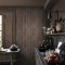 Second room view of Abigail Ahern Linear Luxe Deep Greige wallpaper with layered, elegant decor