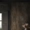 Second room view of Abigail Ahern Oxidized Opulence Moss wallpaper with rich, layered décor