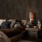 Room styled with Abigail Ahern Oxidized Opulence Moss wallpaper in a moody, organic setting