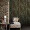 Room styled with Abigail Ahern Oxidized Opulence Moss wallpaper in a moody, organic setting
