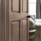 Painted door in Abigail Ahern Sandstone Shadow with cosy, caramel-toned styling
