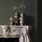 Fireplace wall painted in Abigail Ahern Sea Botanic with earthy, serene styling