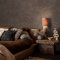 Room styled with Abigail Ahern Urbanite Tadelakt Ground wallpaper in a warm, minimalist setting