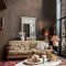 Second room view of Abigail Ahern Urbanite Tadelakt Ground wallpaper with layered neutral decor