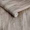 Roll shot of Abigail Ahern Wanderlust Gilded wallpaper showing subtle fibre texture and shimmer
