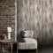 Room styled with Abigail Ahern Wanderlust Gilded wallpaper in a soft, elegant interior