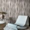 Second room view of Abigail Ahern Wanderlust Gilded wallpaper with warm, sophisticated decor