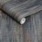 Roll shot of Abigail Ahern Wanderlust Ink wallpaper showing textured shimmer detail