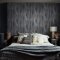 Room styled with Abigail Ahern Wanderlust Ink wallpaper in a moody, sophisticated interior