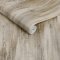 Roll shot of Abigail Ahern Wanderlust Oyster wallpaper showing shimmer and fibre texture