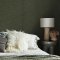 Room styled with Abigail Ahern Weathered Linen Garden wallpaper in a cosy, nature-inspired setting