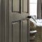 Painted door in Abigail Ahern Wild Millet with warm, organic styling