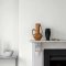 Interior room painted in Craig & Rose Marble Dust with bright, minimalist styling