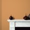 Room painted in Craig & Rose Papyrus with earthy, sunlit styling