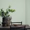 Room painted in Craig & Rose Sung Blue with minimal, serene styling
